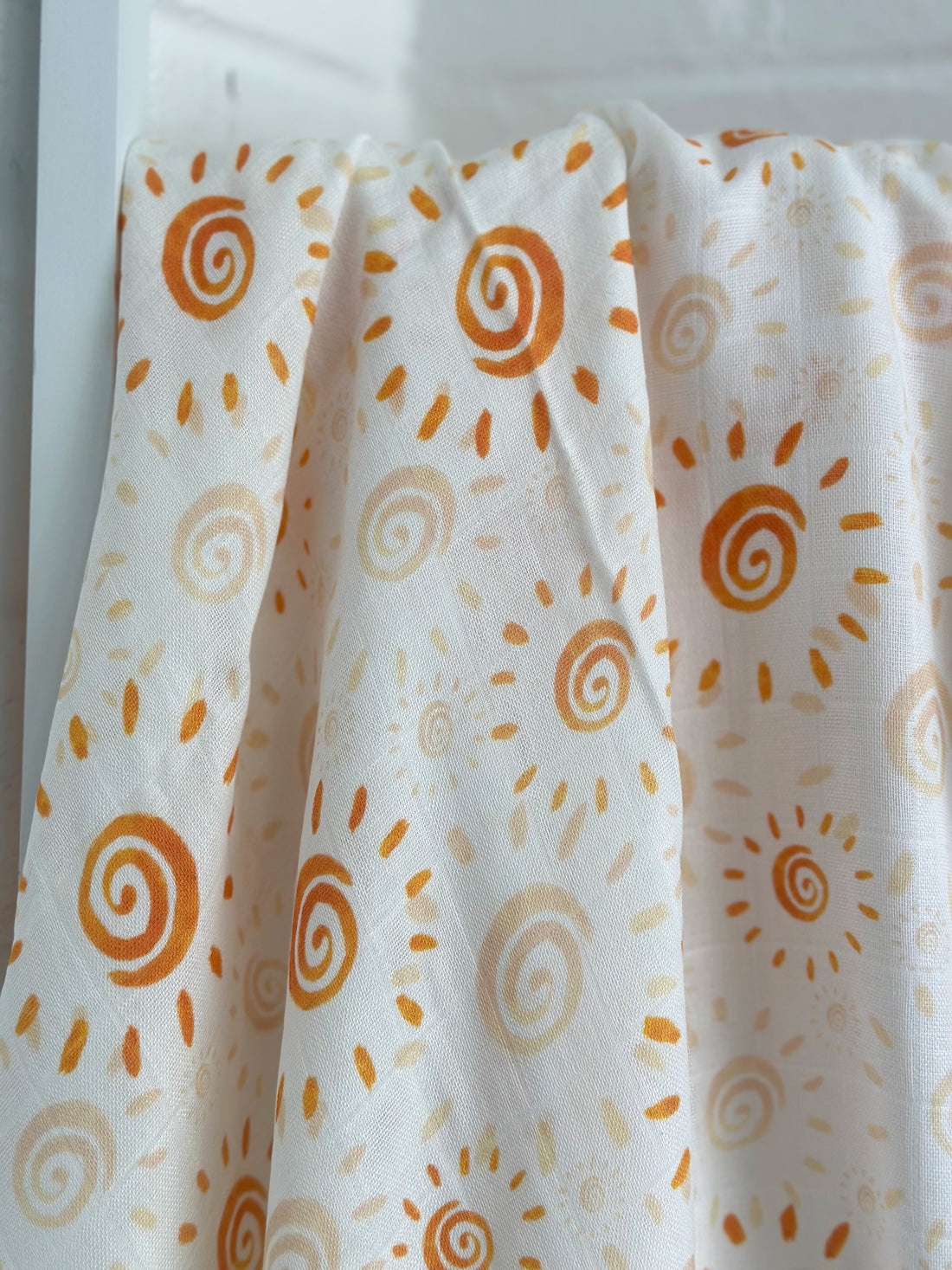 Watercolor Sun Muslin Swaddle