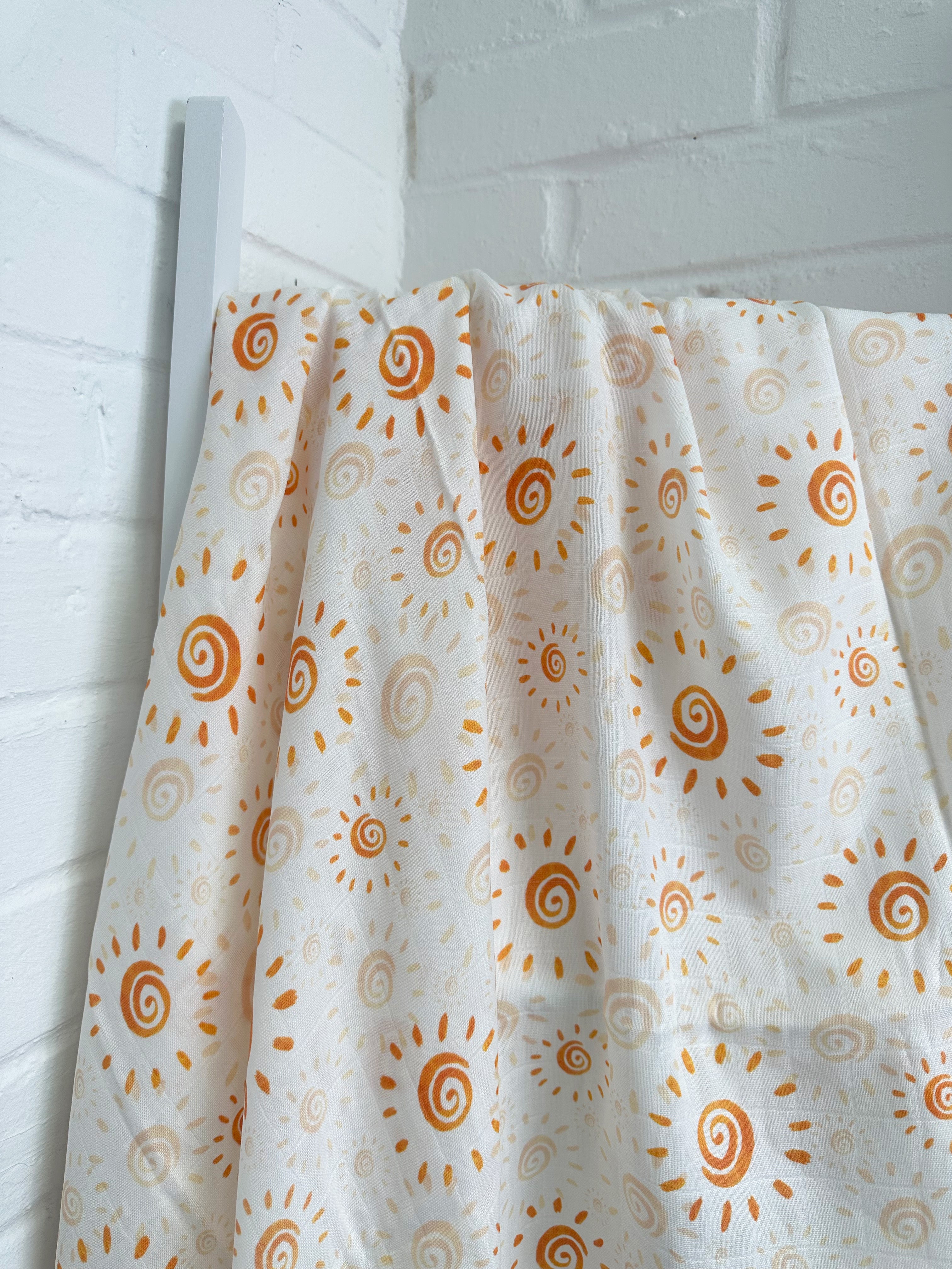 Watercolor Sun Muslin Swaddle