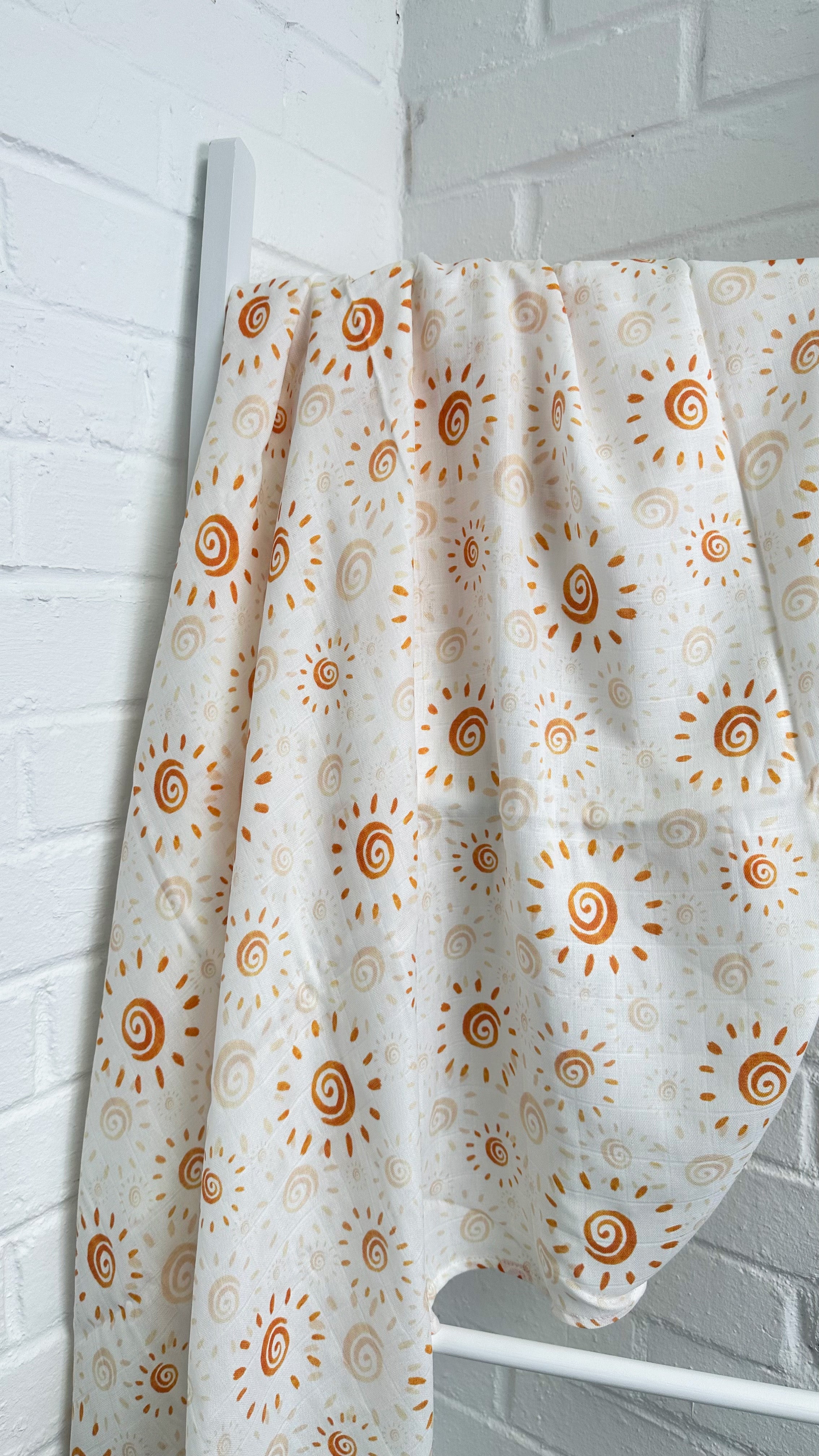 Watercolor Sun Muslin Swaddle