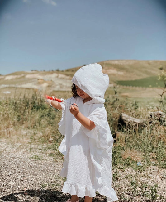 White Muslin Poncho With Ruffles