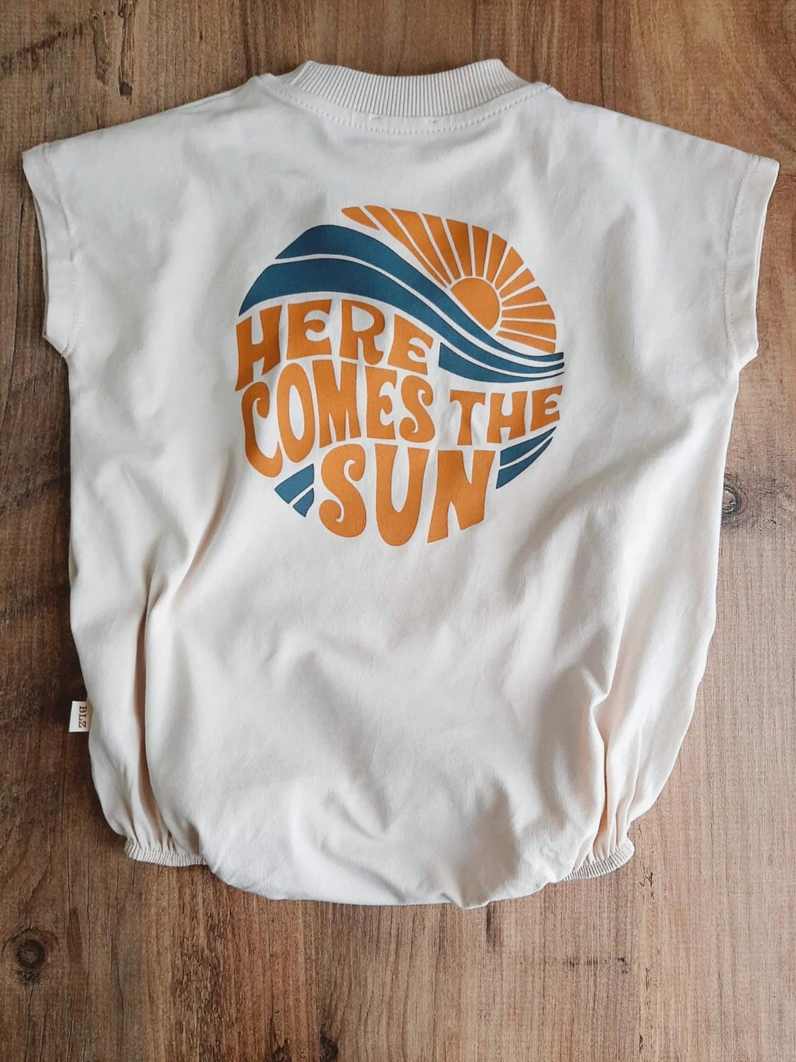 Beige ‘Here Comes The Sun’ Short Sleeve Romper - Blzandco